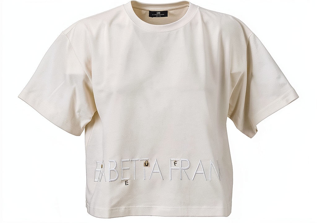 'T-shirt Elisabetta Franchi in cotone colore gesso su sfondo neutro'